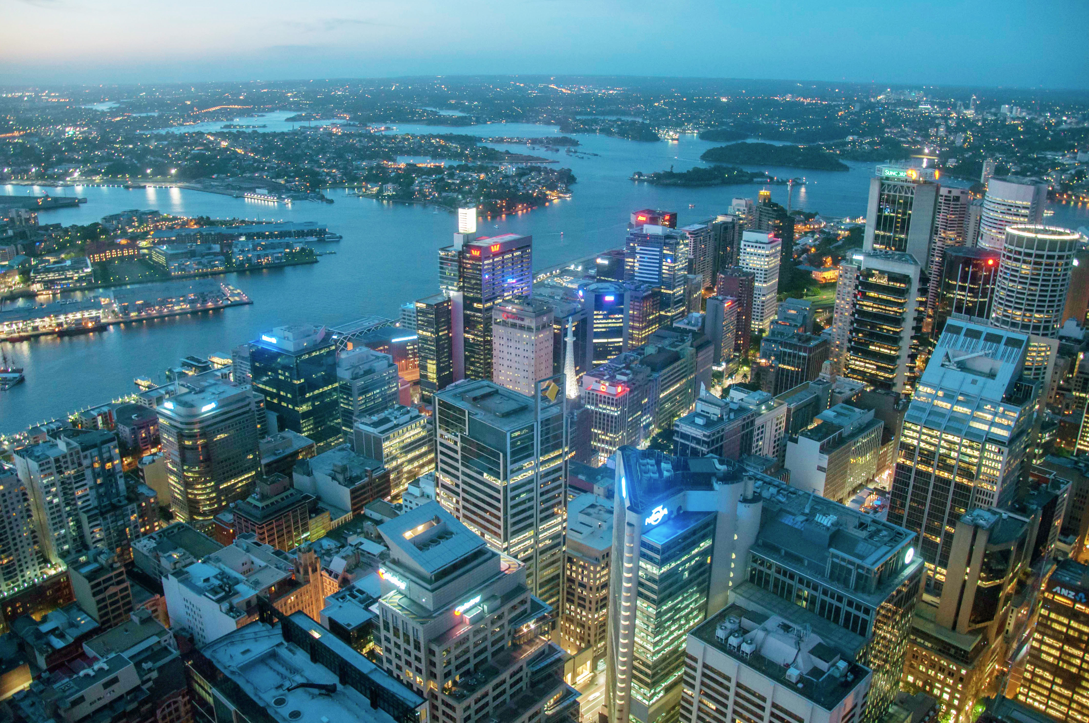 Sydney’s central business district and harbour at blue hour